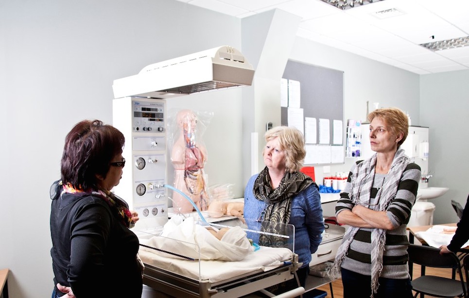 Woman looking at a machine
