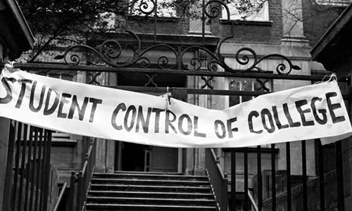 Credit: Associated Press / Alamy Stock Photo. A banner, reading 