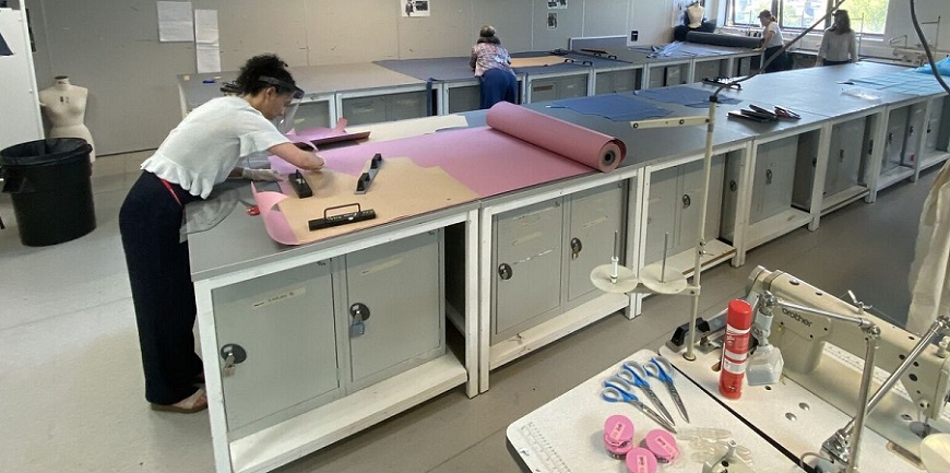 MDX staff producing essential gowns and scrubs for frontline NHS staff.