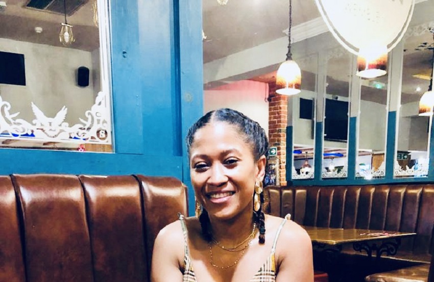 Jezelle sitting in a cafe