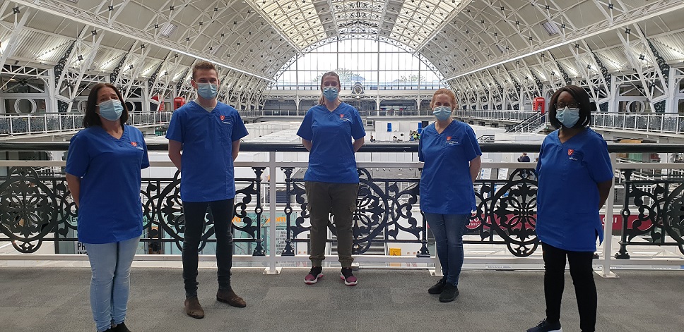 MDX vaccination team pose for a picture at BDC