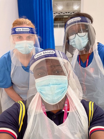 MDX vaccinators pose for a selfie