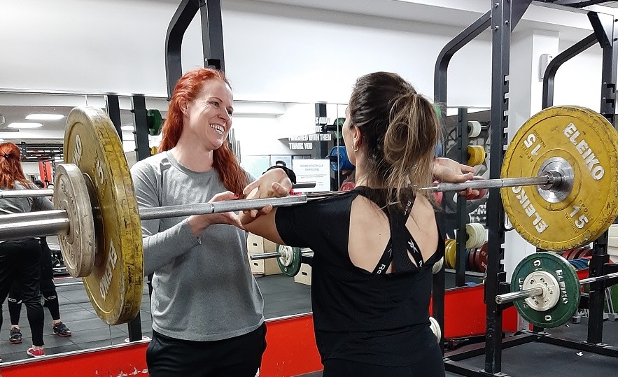 Angela training with a student