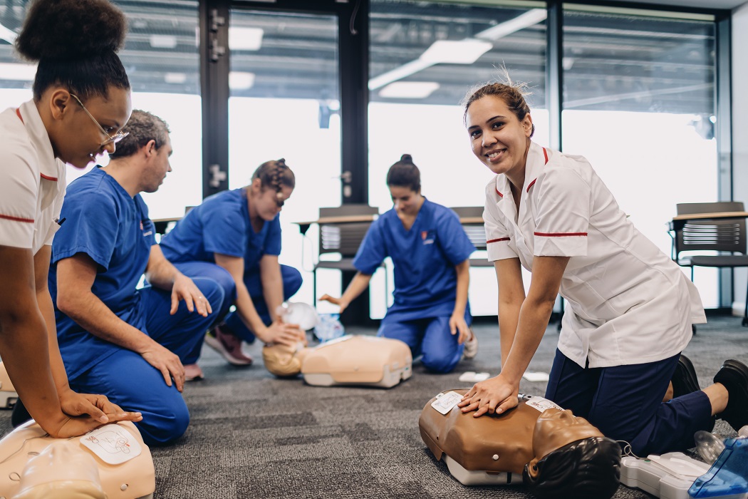 Nurses practicing cardiopulmonary resuscitation