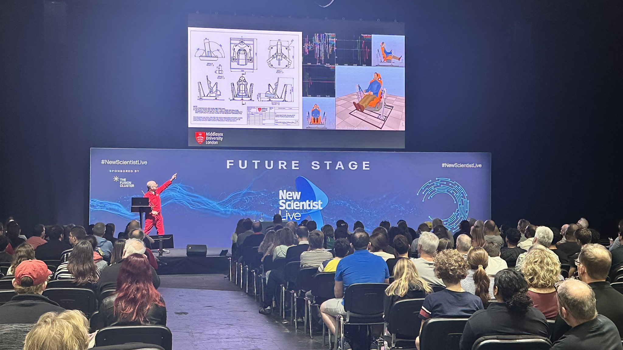 Brendan-Walker-talk-pointing at New Scientist 2023
