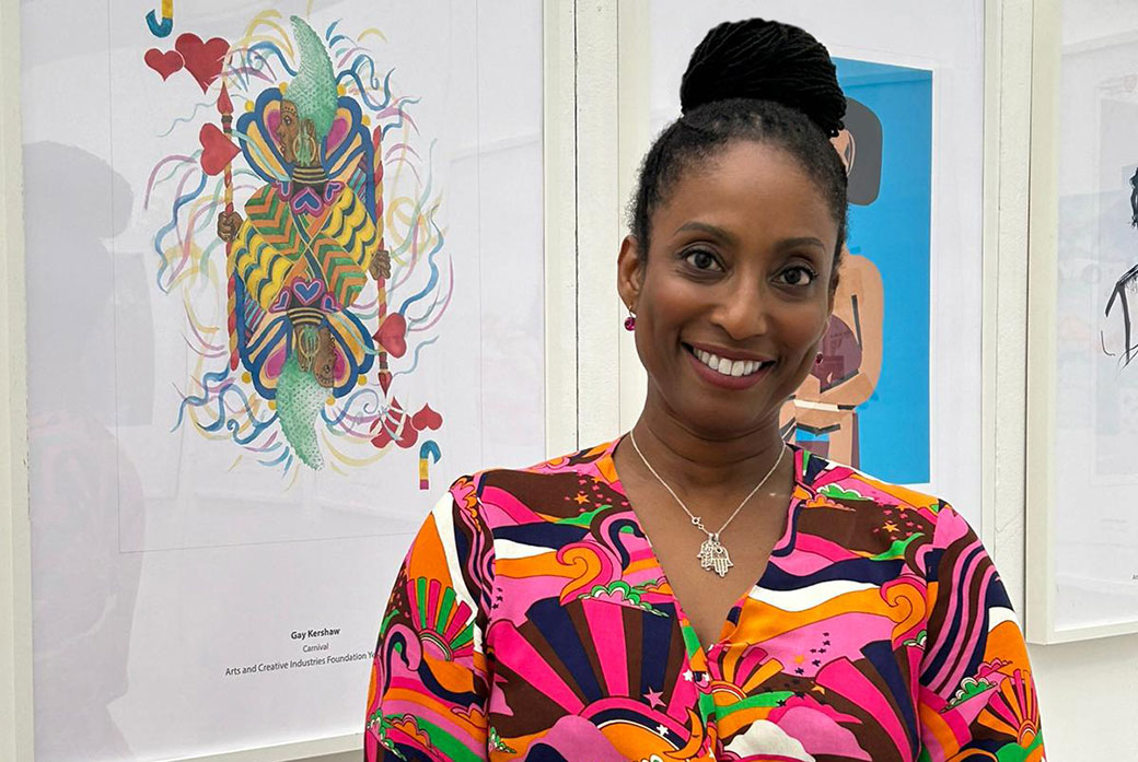 Woman next to her artwork