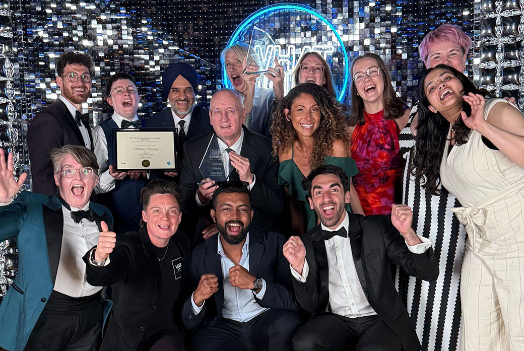 People celebrate at awards ceremony