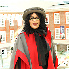 female graduate of middlesex university wearing ceremonial clothing