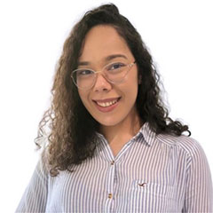 A woman looks at the camera