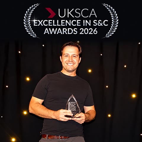 Chris Bishop with his award.