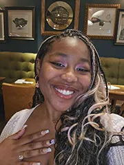 Headshot of a smiling student