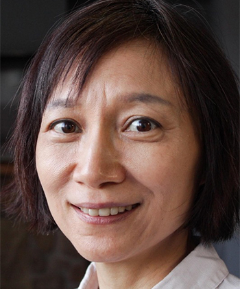 A close up picture of a smiling woman