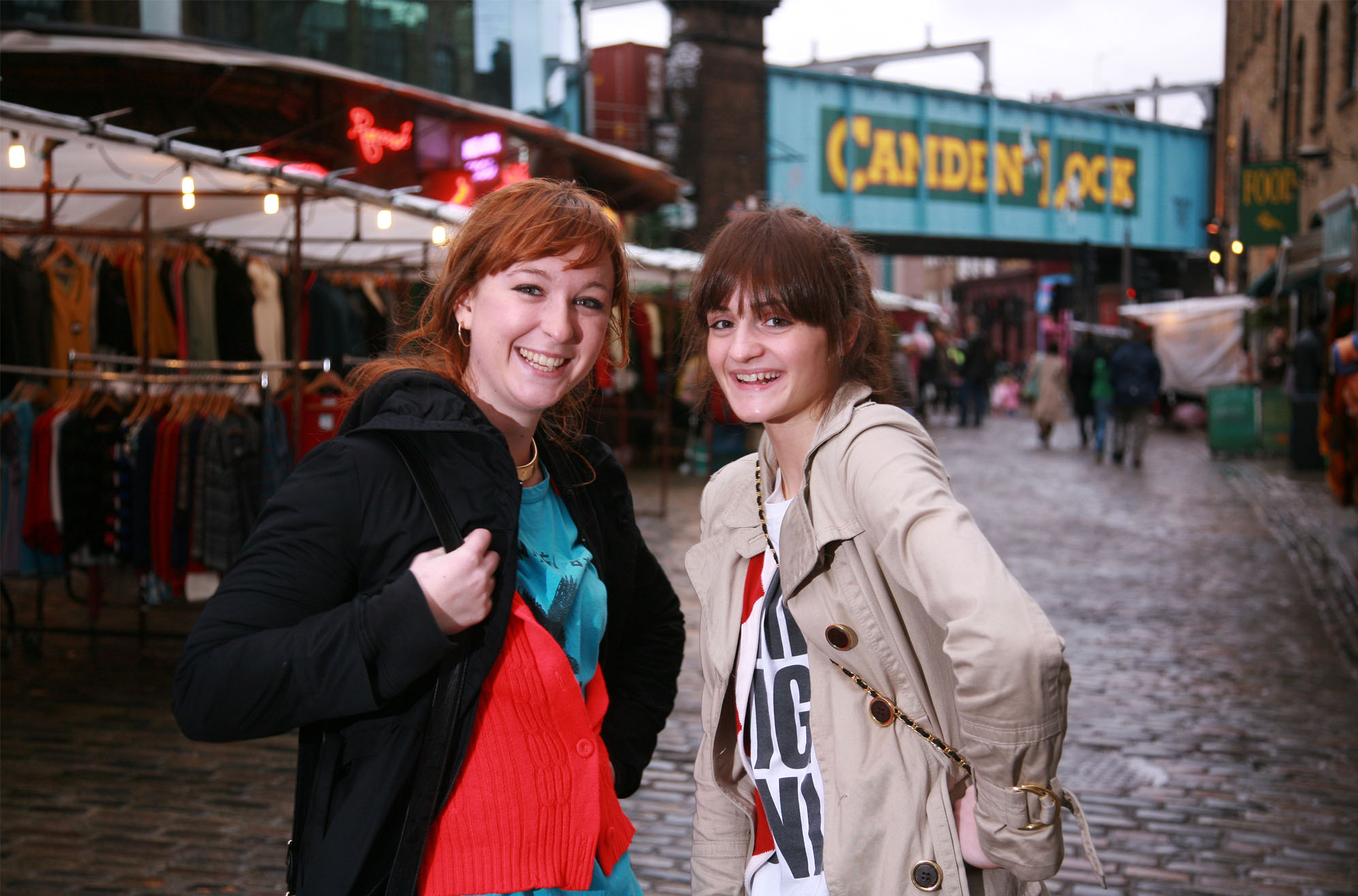 two female middlesex univiersity students shopping at a vintage shop in camden market