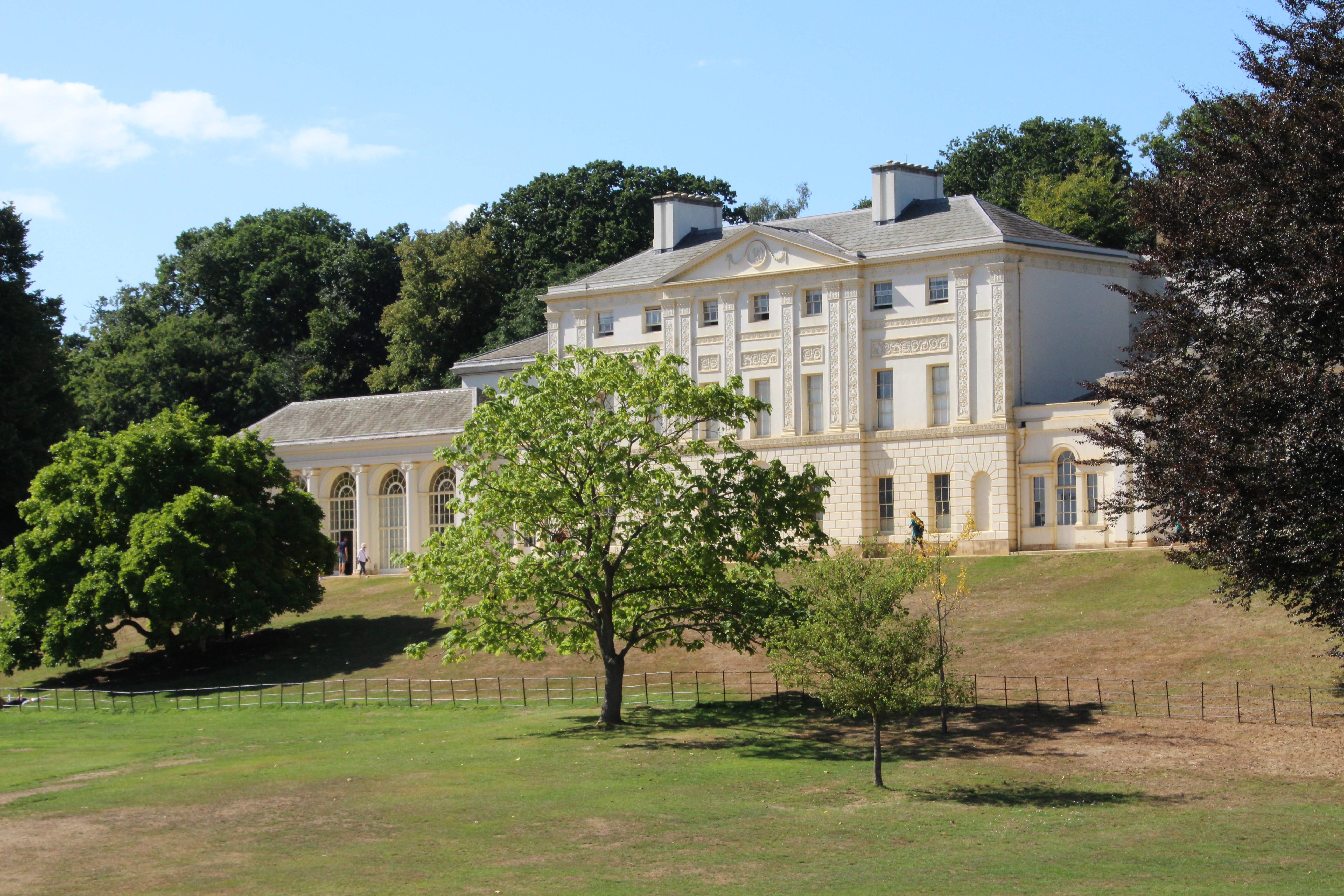 the white facade of hampstead's kenwood house with lawns showing at the front